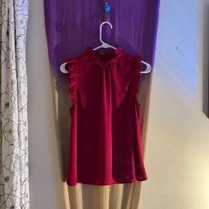 Never worn, ruffled neck red top!